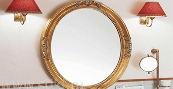 Круглое зеркало в рамке для ванной комнаты